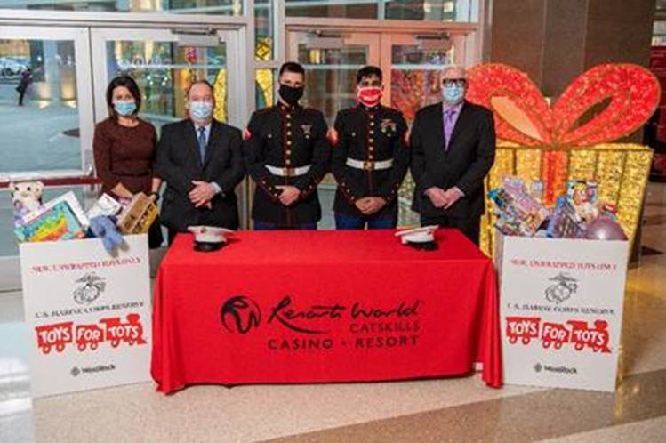 Pictured are Meghan Taylor, vice president of government affairs and community relations at Genting New York State, left; Jack Kennedy, senior vice president of gaming operations at Resorts World Catskills; Sergeant Dewan Singh; Lance Corporal Brandon Zinkiewicz; and Randy Netter, senior vice president of operations, food & beverage at Resorts World Catskills